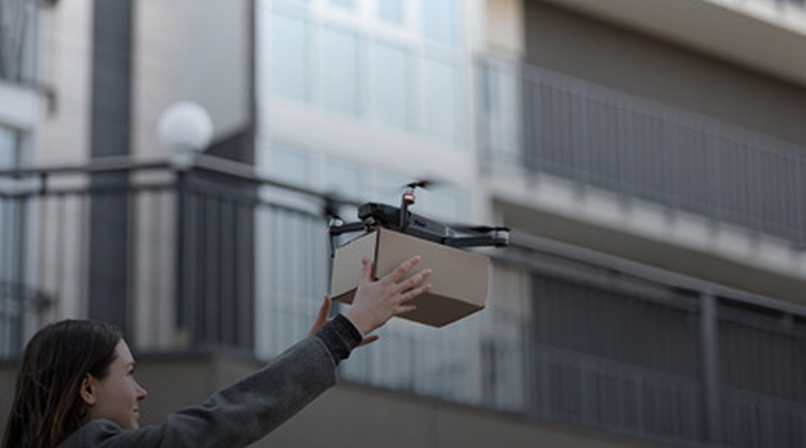 Drone delivery to person on balcony